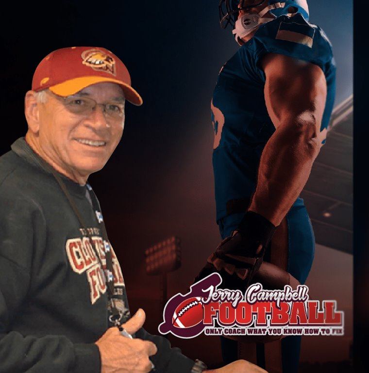 Coach Jerry Campbell signing books at a football clinic
